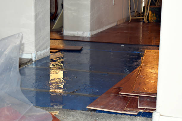 Professional Emergency Water Damage Restoration technician working in West Hyannisport, MA